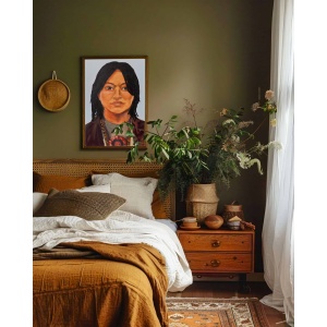 Interior preview: The oil painting 'Whisper of the Earth' displayed in a home setting, showing how its vibrant portrait with realistic details and expressionistic colors complements modern décor.