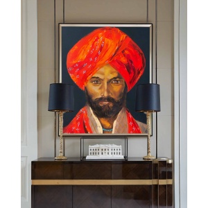 Interior preview: The oil painting "Train to Pakistan" displayed in a home setting, showing how its vibrant portrait with realistic details and expressionistic colors complements modern décor.