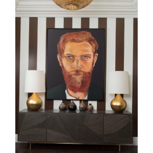 Red Flame oil painting displayed in a modern interior, showcasing the bold portrait of a red-haired Irish man