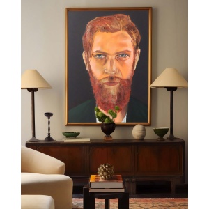 Red Flame oil painting displayed in a modern interior, showcasing the bold portrait of a red-haired Irish man